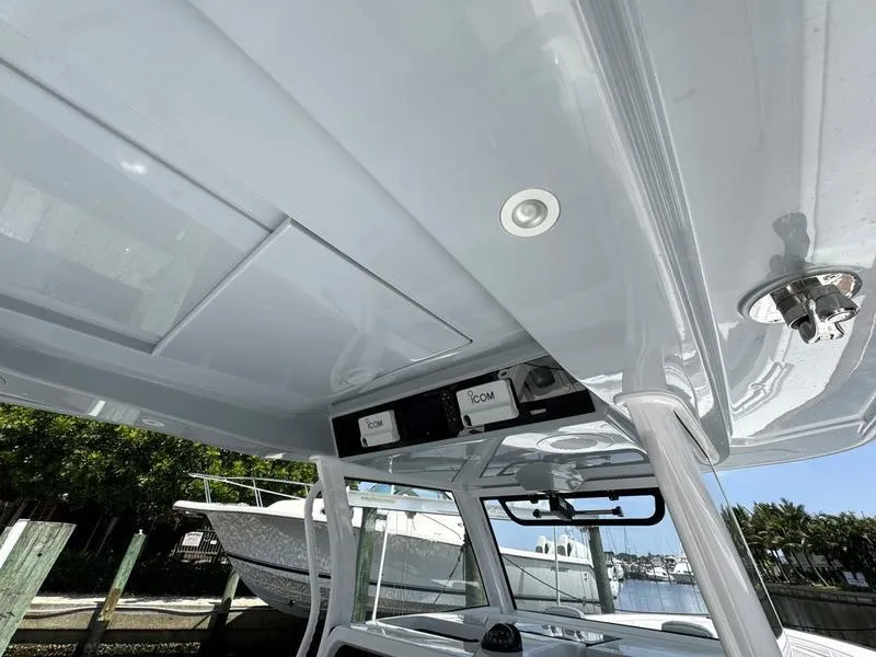 Slide: The Image of Phenom 37 boat interior, 2025 model, featuring sleek design and advanced electronics. - 40