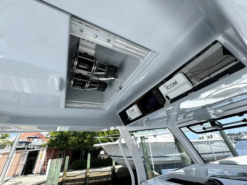 Slide: The Image of Phenom 37 boat interior, 2025 model, featuring advanced electronic equipment and sleek design. - 41