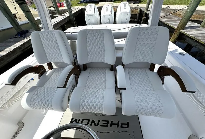 Slide: The Image of Luxury seating on 2025 Phenom 37 boat with triple engines. - 42