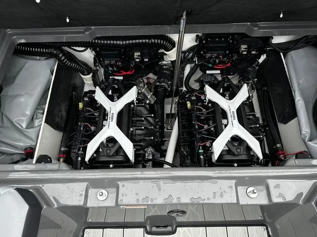 Slide: The Image of 2025 Yamaha Boats 222XD engine compartment with dual engines and advanced components. - 13