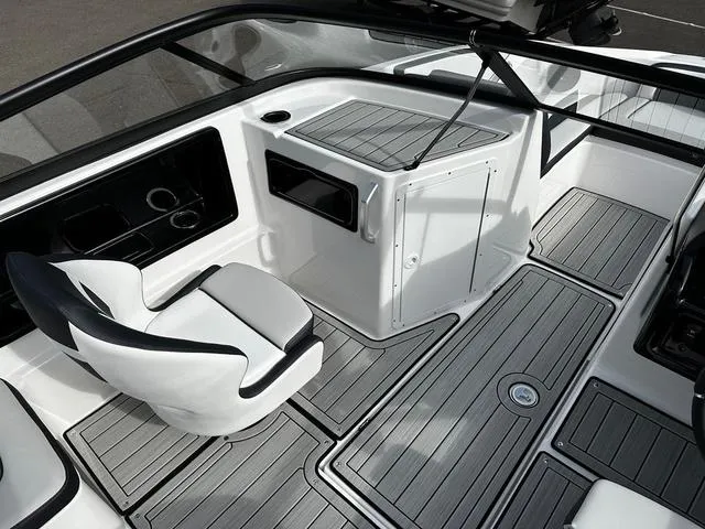 Slide: The Image of 2025 Yamaha Boats 195S interior with sleek seating and modern design. - 10