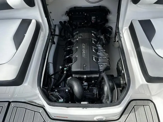 Slide: The Image of 2025 Yamaha Boats 195S engine compartment, showcasing sleek design and advanced technology. - 13