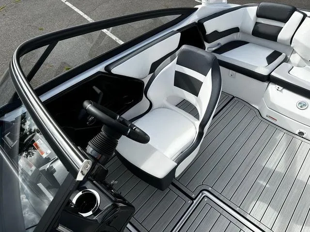 Slide: The Image of 2025 Yamaha Boats 195S interior with sleek seating and modern design. - 8