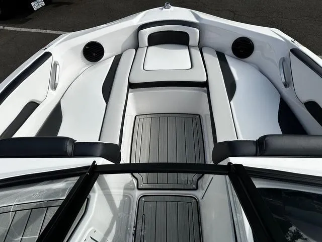 Slide: The Image of Interior view of 2025 Yamaha Boats 195S, featuring sleek seating and modern design. - 9