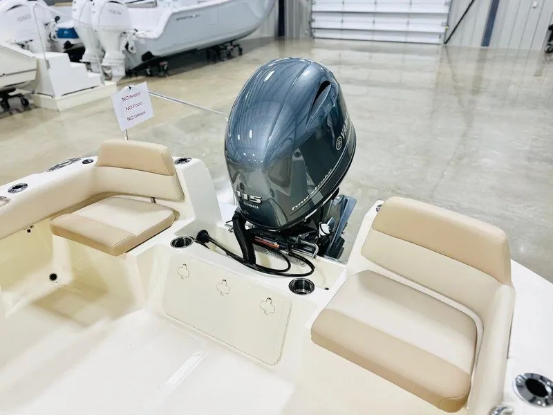 Slide: The Image of 2025 Scout 195 Sport Dorado boat with Yamaha 115 outboard motor in showroom. - 10