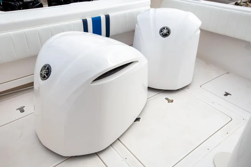 Slide: The Image of 2011 Intrepid 32 boat with Yamaha engine covers on deck. - 23