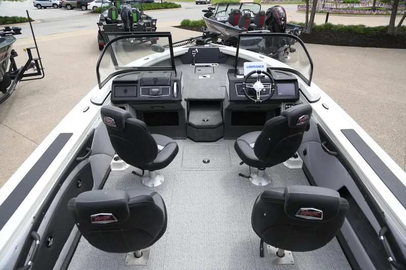 Slide: The Image of 2024 Ranger VX1988 WT boat interior with four seats and modern dashboard. - 3