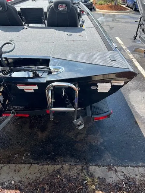 Slide: The Image of 2024 Ranger RT178C boat rear view with ladder and seating. - 4