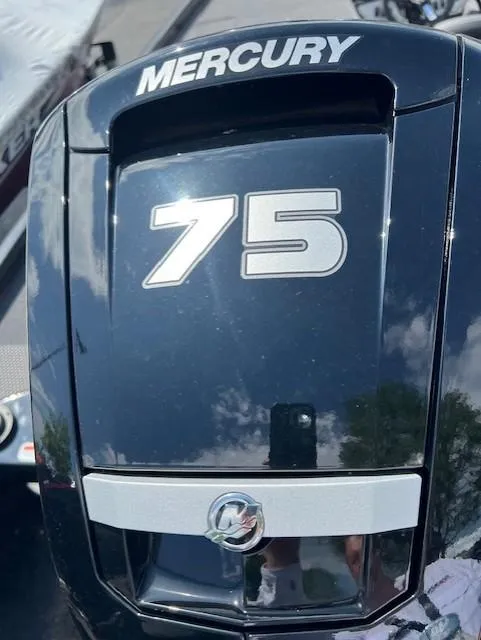 Slide: The Image of Mercury 75 horsepower engine on 2024 Ranger RT178C boat, reflecting sky and trees. - 5