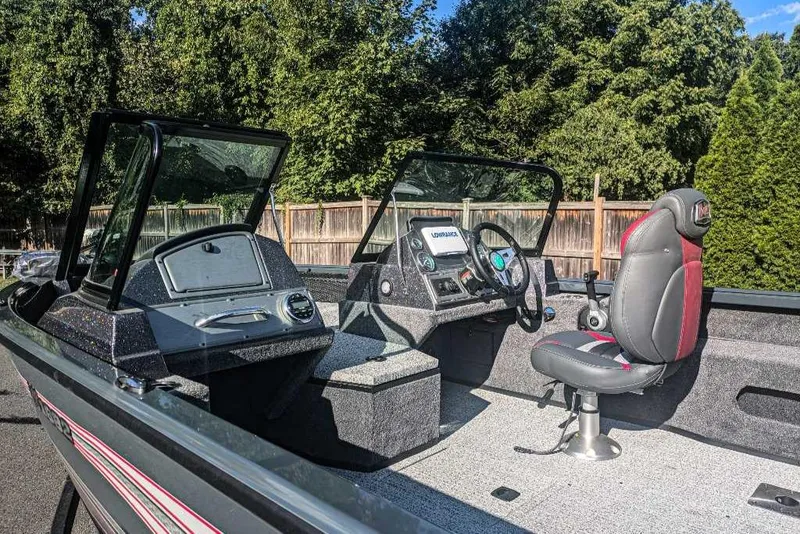 Slide: The Image of 2024 Ranger VS1682SC Angler boat interior with steering console and seating. - 3