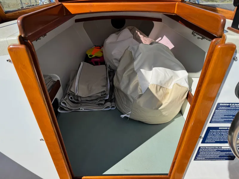 Slide: The Image of Interior of 2015 Devlin Pelicano 20 boat with storage and equipment. - 19