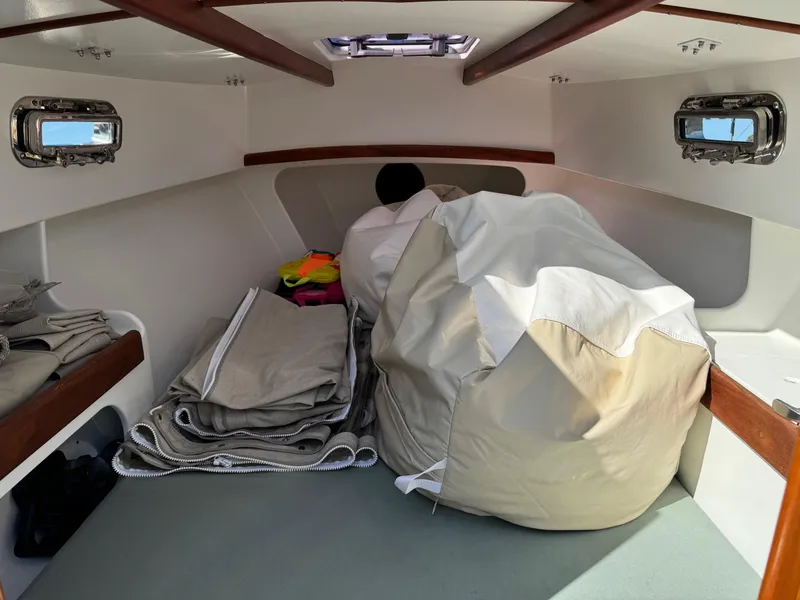 Slide: The Image of Interior of 2015 Devlin Pelicano 20 boat with storage and cushions. - 22