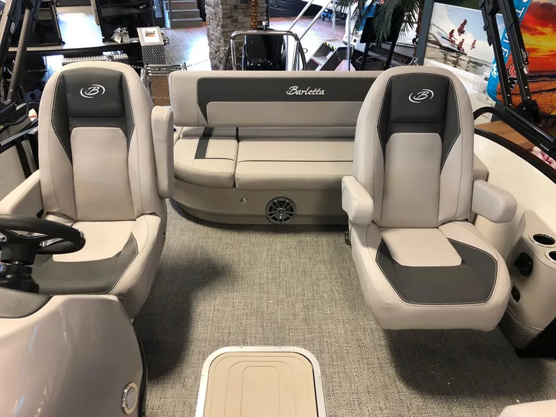Slide: The Image of 2025 Barletta ARIA 20UC boat interior with plush seating and modern design. - 6