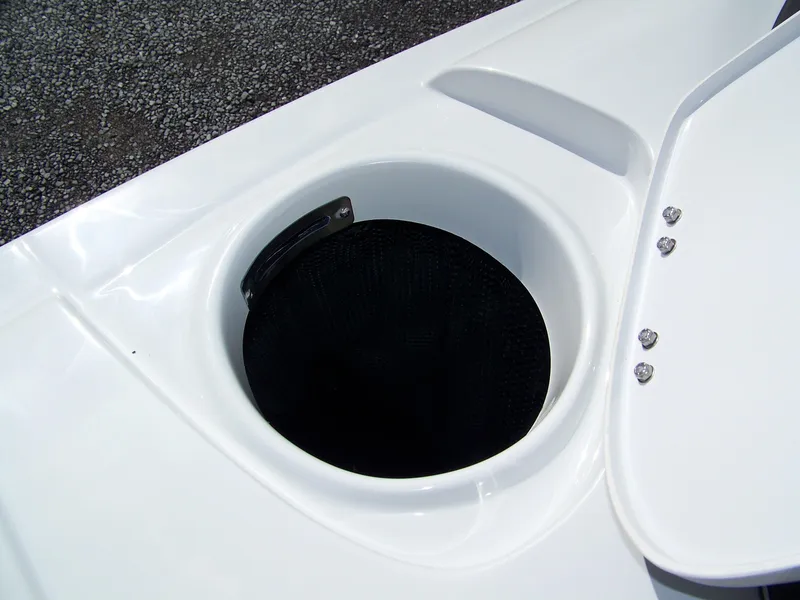 Slide: The Image of 2023 Crownline Eclipse E255 boat storage compartment with sleek white finish. - 11