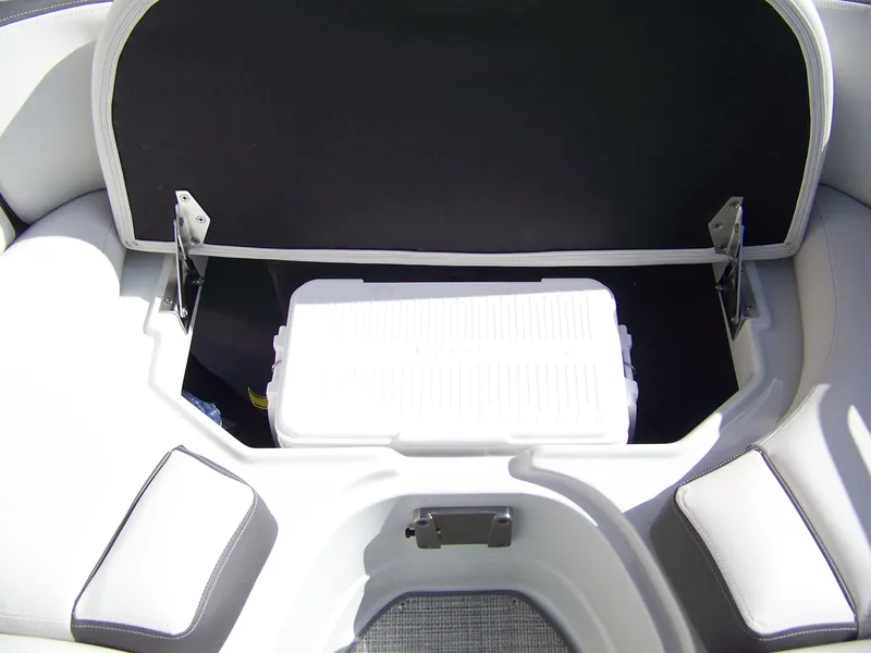 Slide: The Image of 2023 Crownline Eclipse E255 boat storage compartment with cooler. - 13