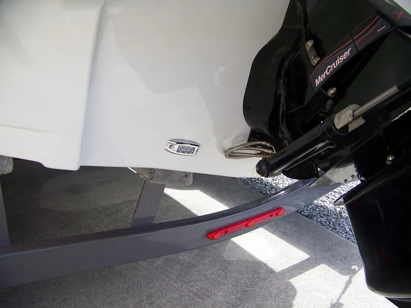 Slide: The Image of 2023 Crownline Eclipse E255 boat with MerCruiser engine detail. - 20