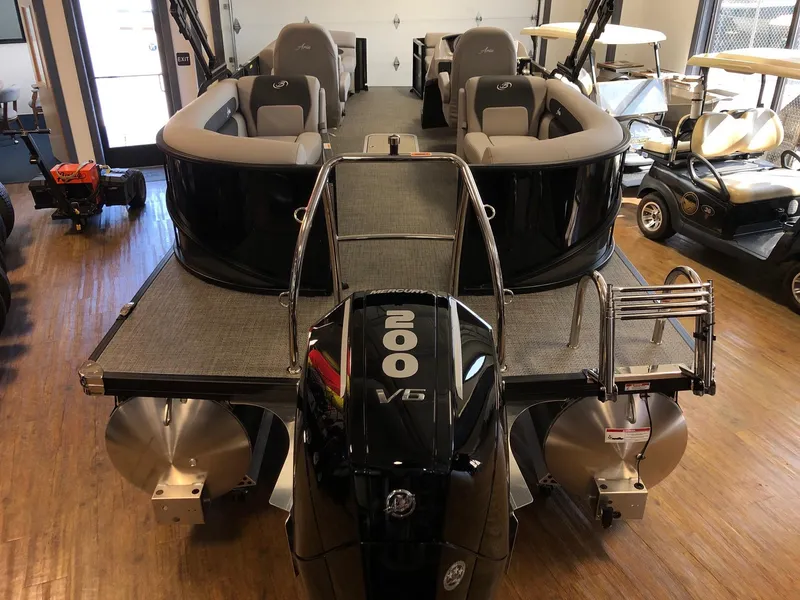 Slide: The Image of 2025 Barletta ARIA 22QC pontoon boat with powerful 200 V6 engine in showroom. - 3