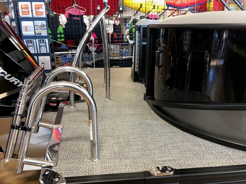 Slide: The Image of 2025 Barletta ARIA 22QC pontoon boat deck with stainless steel railings. - 4