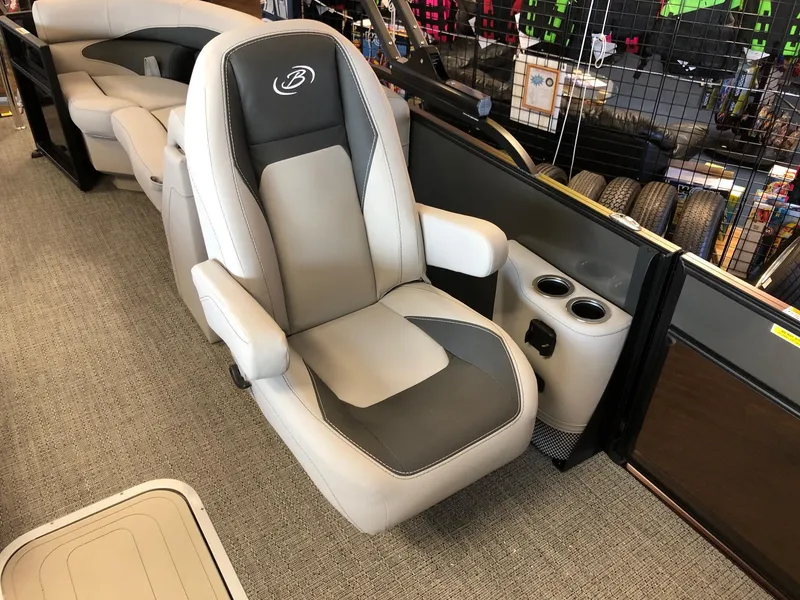 Slide: The Image of Barletta ARIA 22QC 2025 boat seat with cup holders, gray and black design. - 9