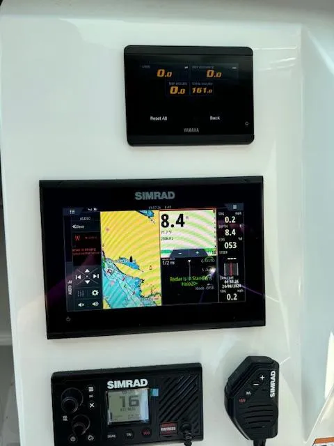Slide: The Image of Simrad navigation system in 2021 Parker 2320 Sport Cabin boat cockpit. - 9