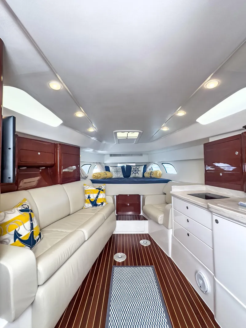 Slide: The Image of Luxurious interior of a 2017 Intrepid 430 Sport Yacht with elegant seating and modern amenities. - 10