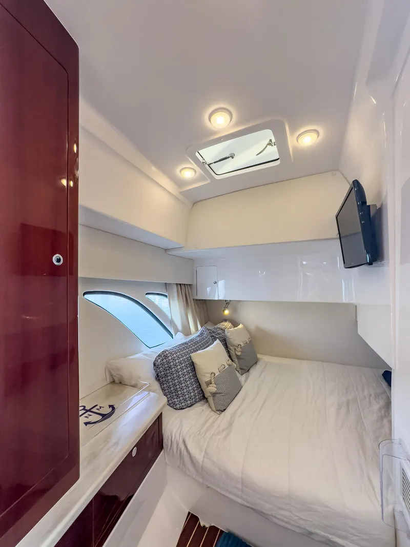 Slide: The Image of Luxurious cabin interior of a 2017 Intrepid 430 Sport Yacht with modern amenities. - 16