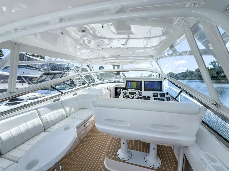 Slide: The Image of 2017 Intrepid 430 Sport Yacht interior with sleek design and advanced navigation system. - 2