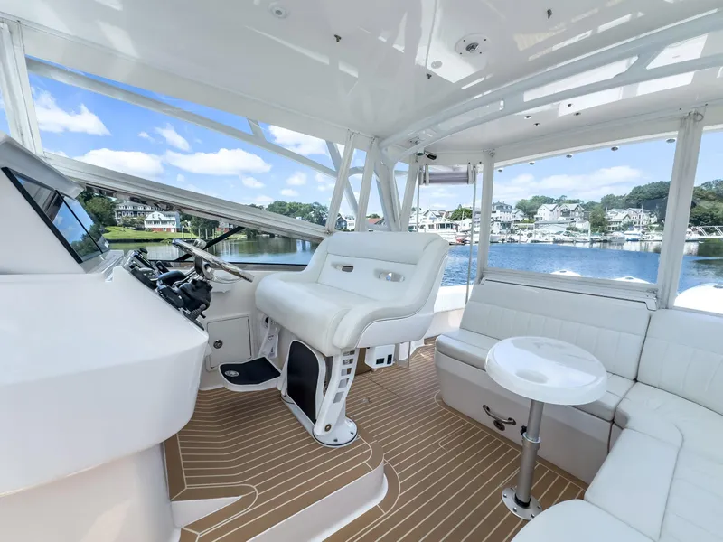 Slide: The Image of Luxurious interior of 2017 Intrepid 430 Sport Yacht with scenic water view. - 30