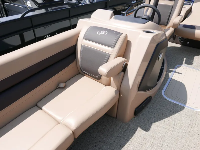Slide: The Image of 2025 Barletta Cabrio 24UC boat interior with beige seating and modern design. - 10