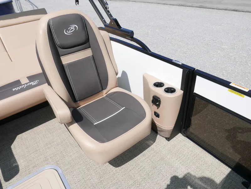 Slide: The Image of 2025 Barletta Cabrio 24UC boat seat with cup holders and beige upholstery. - 14