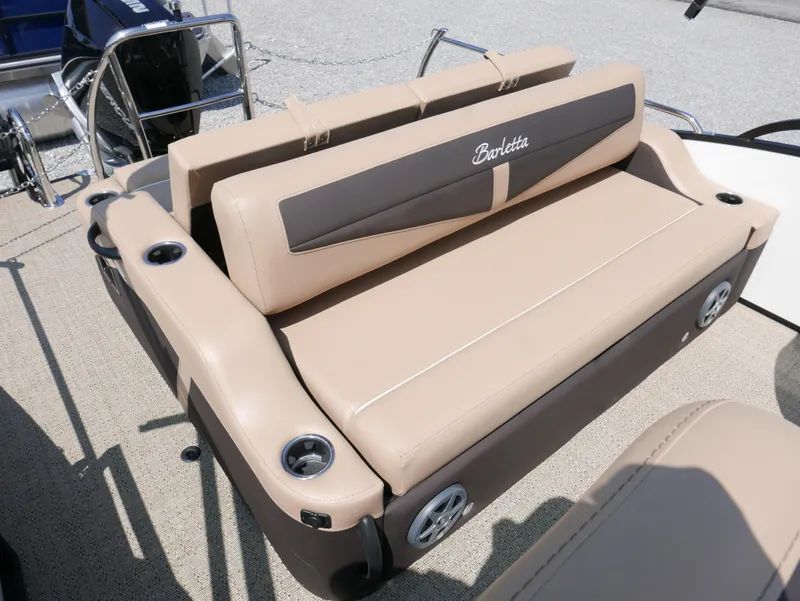 Slide: The Image of Barletta Cabrio 24UC 2025 boat seating, beige upholstery with cup holders. - 20
