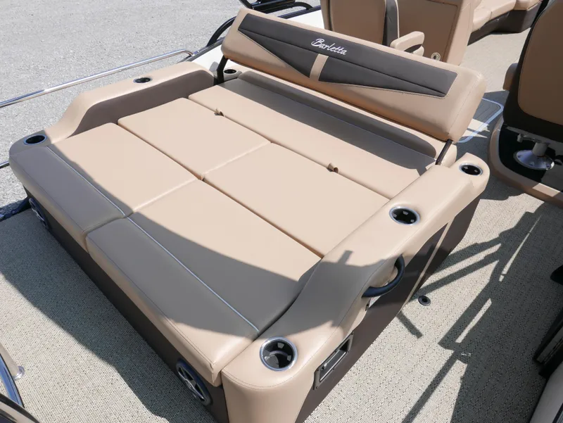 Slide: The Image of 2025 Barletta Cabrio 24UC boat seating with cup holders, beige upholstery. - 27
