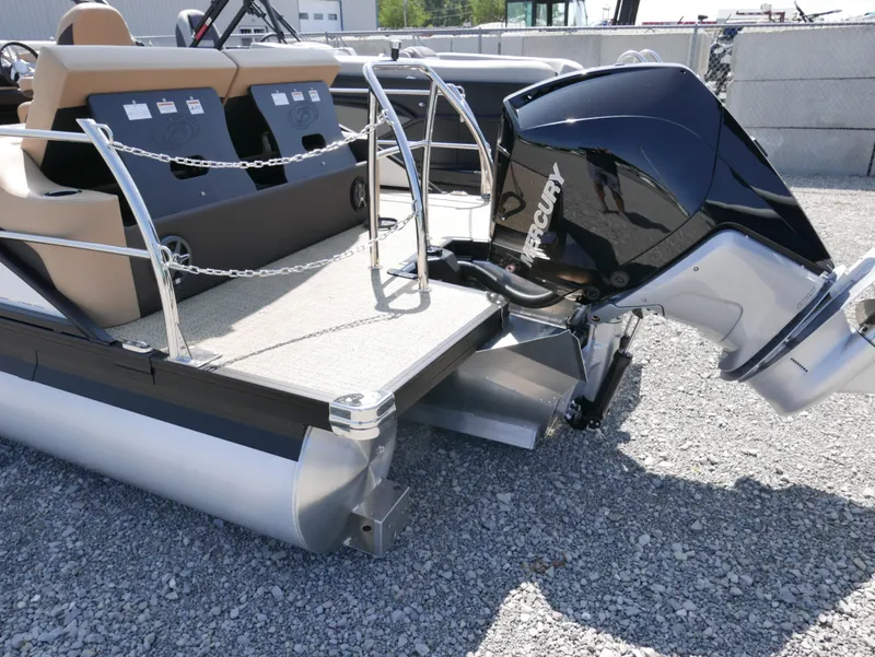 Slide: The Image of 2025 Barletta Cabrio 24UC pontoon boat with Mercury outboard engine, rear view. - 3