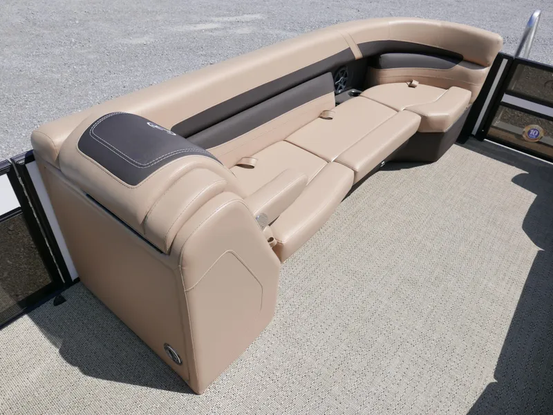 Slide: The Image of 2025 Barletta Cabrio 24UC boat interior with beige seating and modern design. - 6