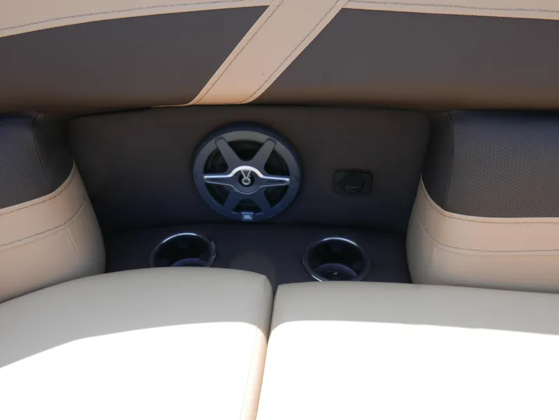 Slide: The Image of 2025 Barletta Cabrio 24UC interior with speaker and cup holders. - 8