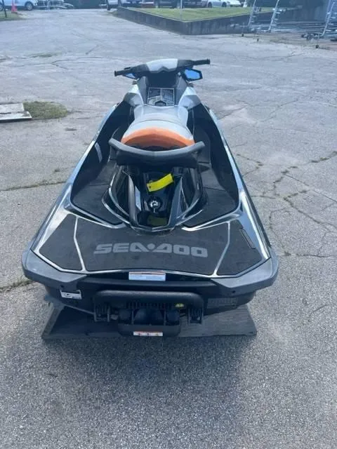 Slide: The Image of 2012 Sea-Doo GTI SE 155 jet ski on pavement, rear view. - 4