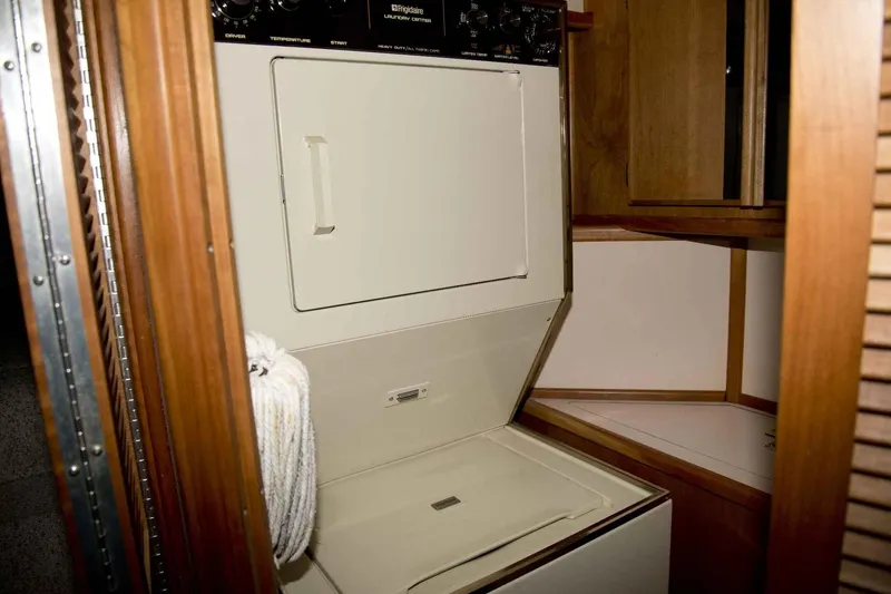 Slide: The Image of Laundry area in 1989 Sea Ray 440 Aft Cabin yacht interior. - 23