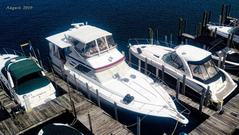 Slide: The Image of 1989 Sea Ray 440 Aft Cabin yacht docked at marina, August 2019. - 3