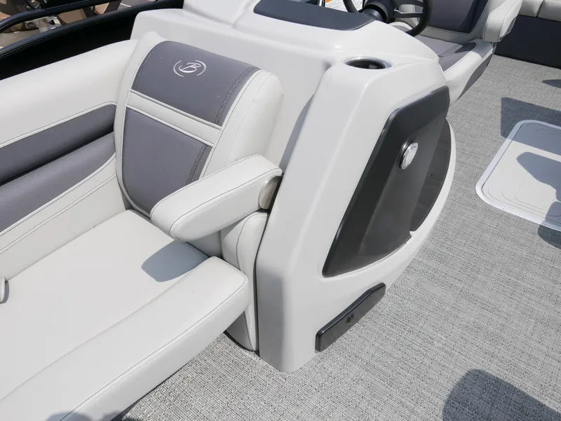 Slide: The Image of 2025 Barletta Cabrio 24UE boat interior with gray seating and modern design. - 14