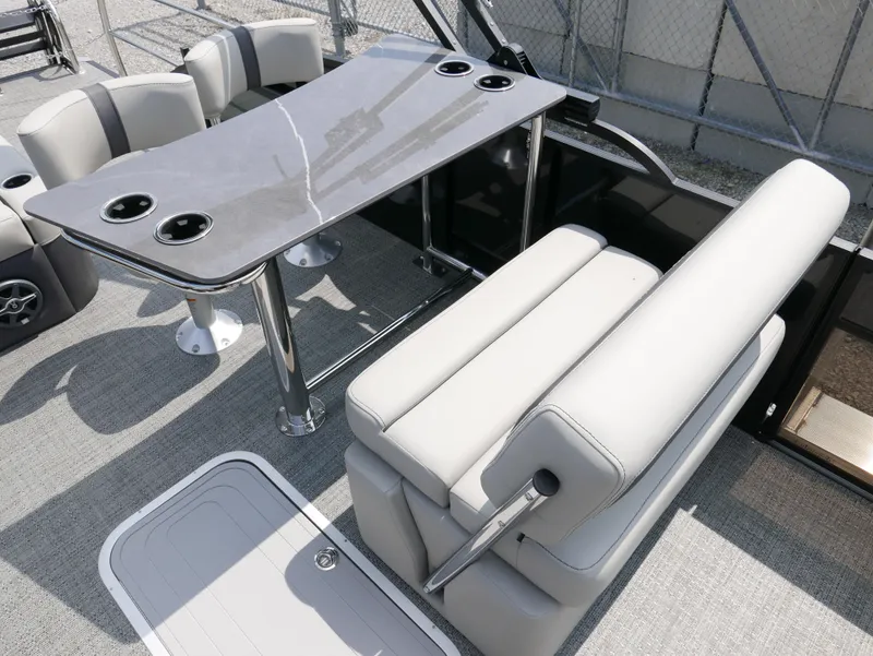 Slide: The Image of Barletta Cabrio 24UE 2025 interior with sleek seating and modern table design. - 16