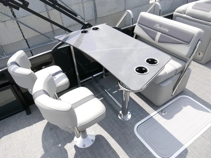 Slide: The Image of Luxury seating area on 2025 Barletta Cabrio 24UE pontoon boat. - 17