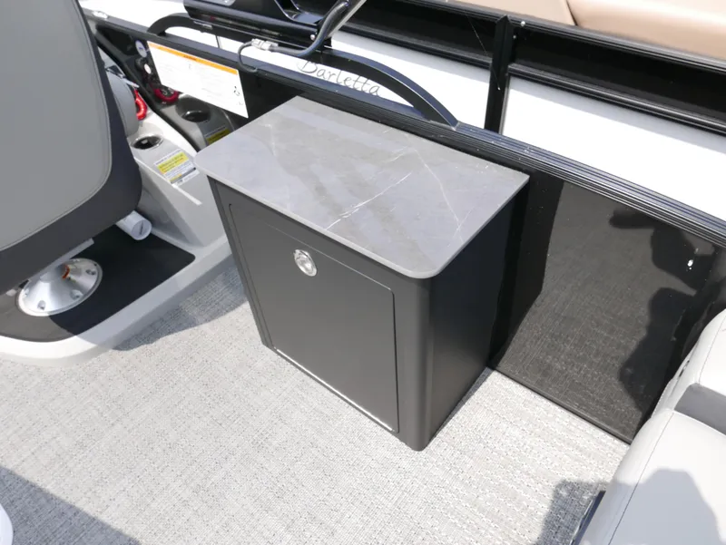 Slide: The Image of 2025 Barletta Cabrio 24UE interior with sleek storage compartment and modern design. - 22