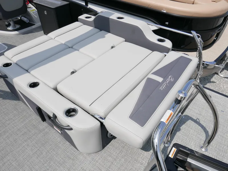 Slide: The Image of 2025 Barletta Cabrio 24UE boat seating with cup holders and sleek design. - 27