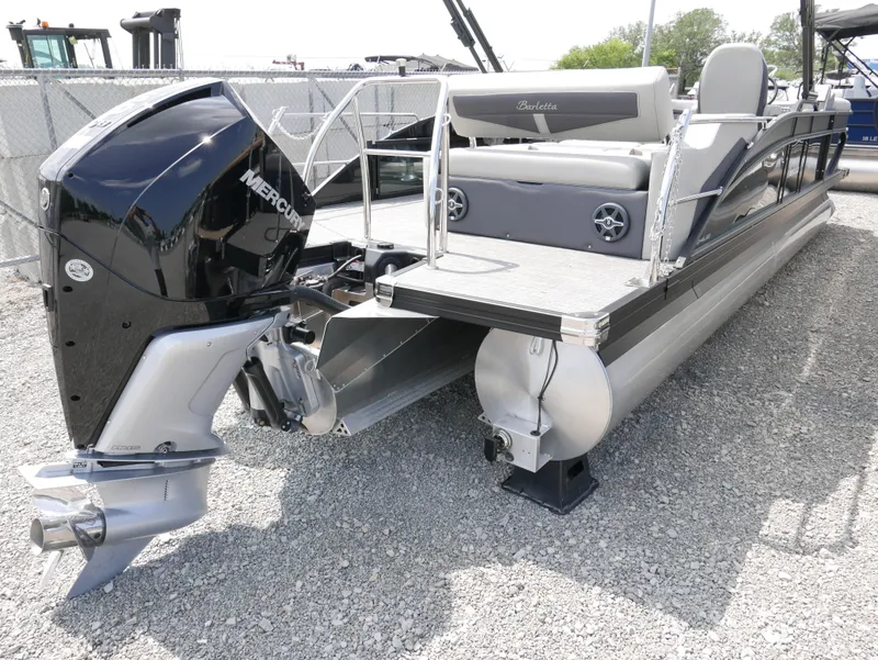 Slide: The Image of 2025 Barletta Cabrio 24UE pontoon boat with Mercury outboard engine. - 6