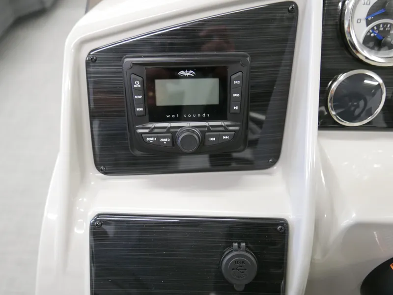 Slide: The Image of 2025 Sylvan Mirage 8520 LZ dashboard with audio system and controls. - 11