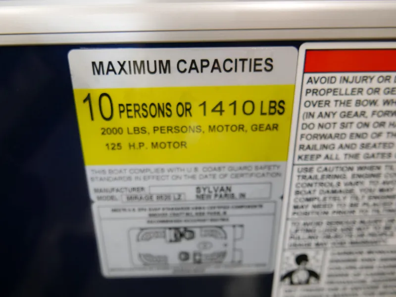 Slide: The Image of Sylvan Mirage 8520 LZ 2025 capacity label: 10 persons or 1410 lbs, 125 HP motor. - 12