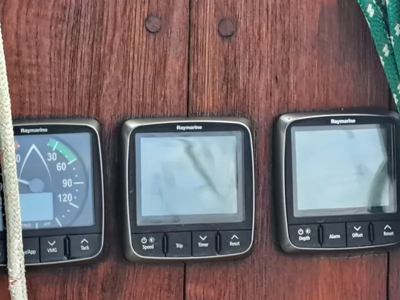 Slide: The Image of Raymarine instruments on 1979 Newport Mark II sailboat dashboard. - 16