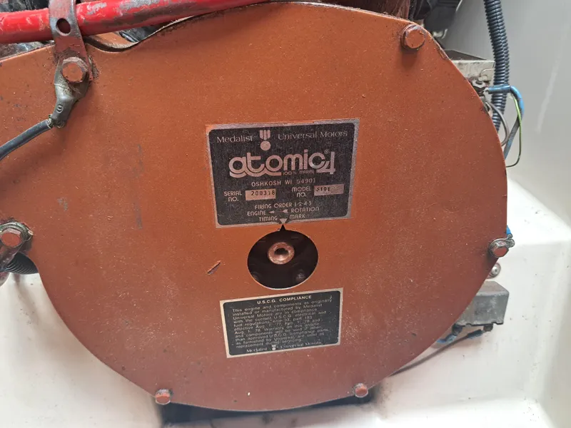 Slide: The Image of Rusty Atomic 4 engine component from a 1979 Newport Mark II boat. - 33