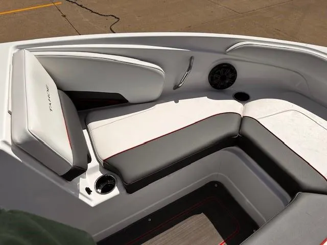 Slide: The Image of 2023 Tahoe 210 S Limited boat interior with white and gray seating. - 15