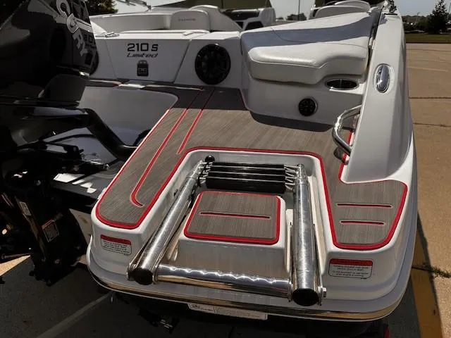 Slide: The Image of 2023 Tahoe 210 S Limited boat with swim platform and ladder. - 4
